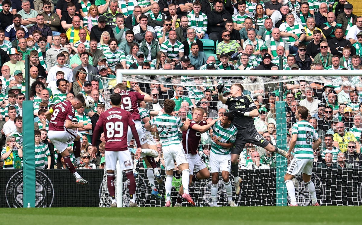 Hearts' Lawrence Shankland ghosts in at the far post to head home and open the scoring.