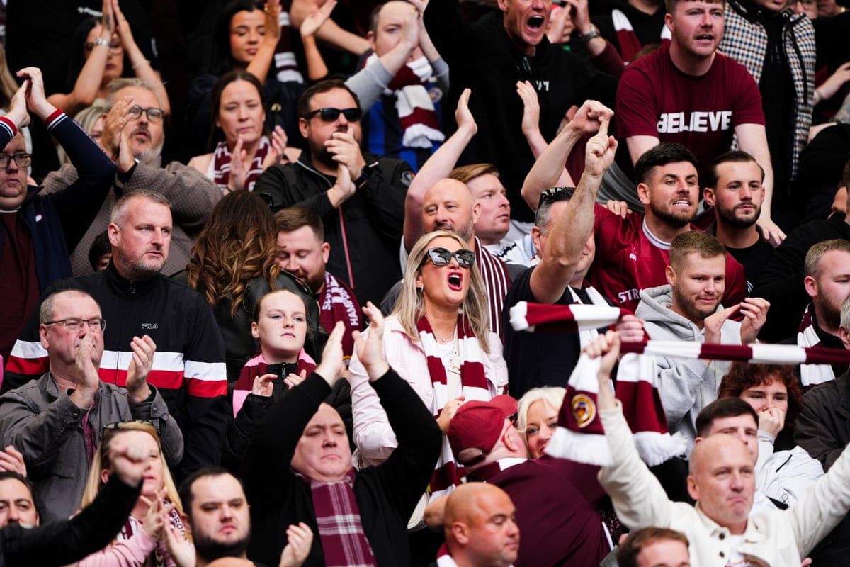 Heart of Midlothian fans cheer ahead of the Premiership title decider at Celtic.