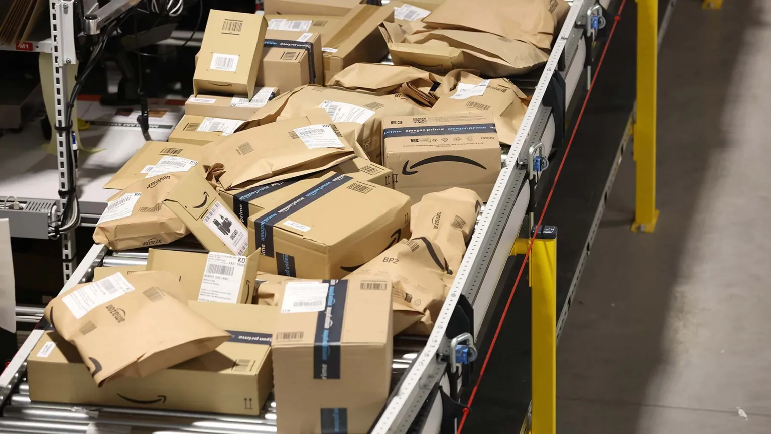  Amazon Boxes are prepared for delivery at Amazon's Robotic Fulfillment Centre on December 19, 2023 in Sutton Coldfield, England.