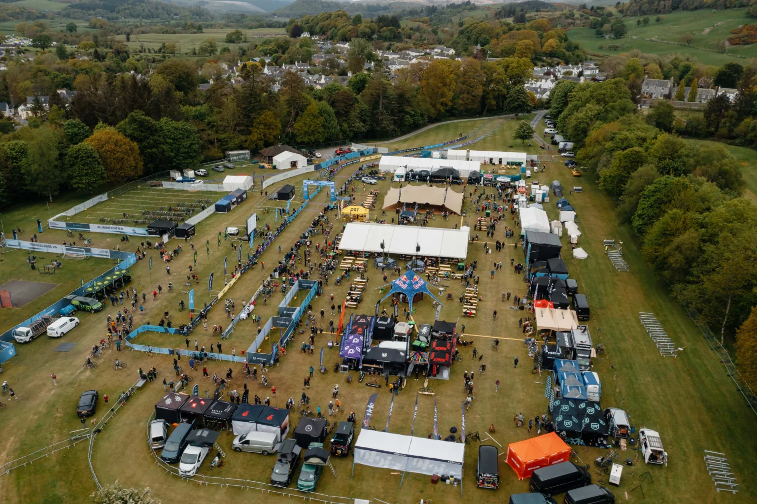 Red On Sports An aerial view of the tents and cars gathered at the Gralloch event in Galloway