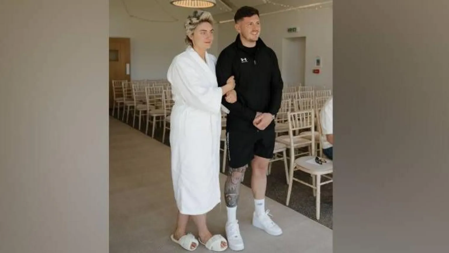 Kennedy News Ashleigh Stanley and childhood sweetheart Jake Stanley. They are dressed in casual clothes at their wedding 