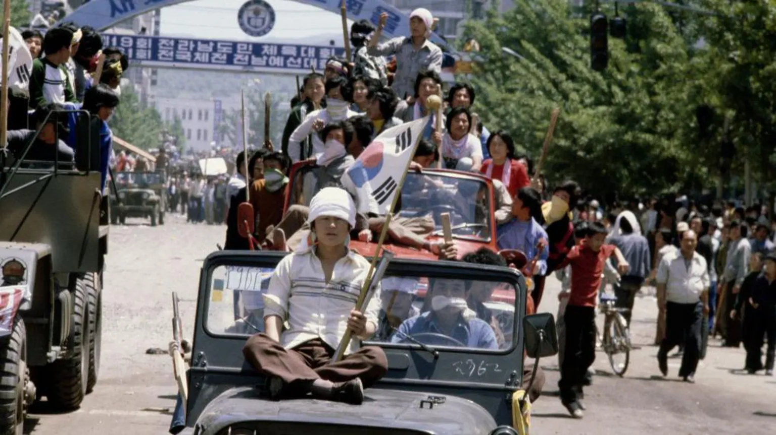 Protesters comandeering military vehicles during the Gwangju Uprising in May 1980