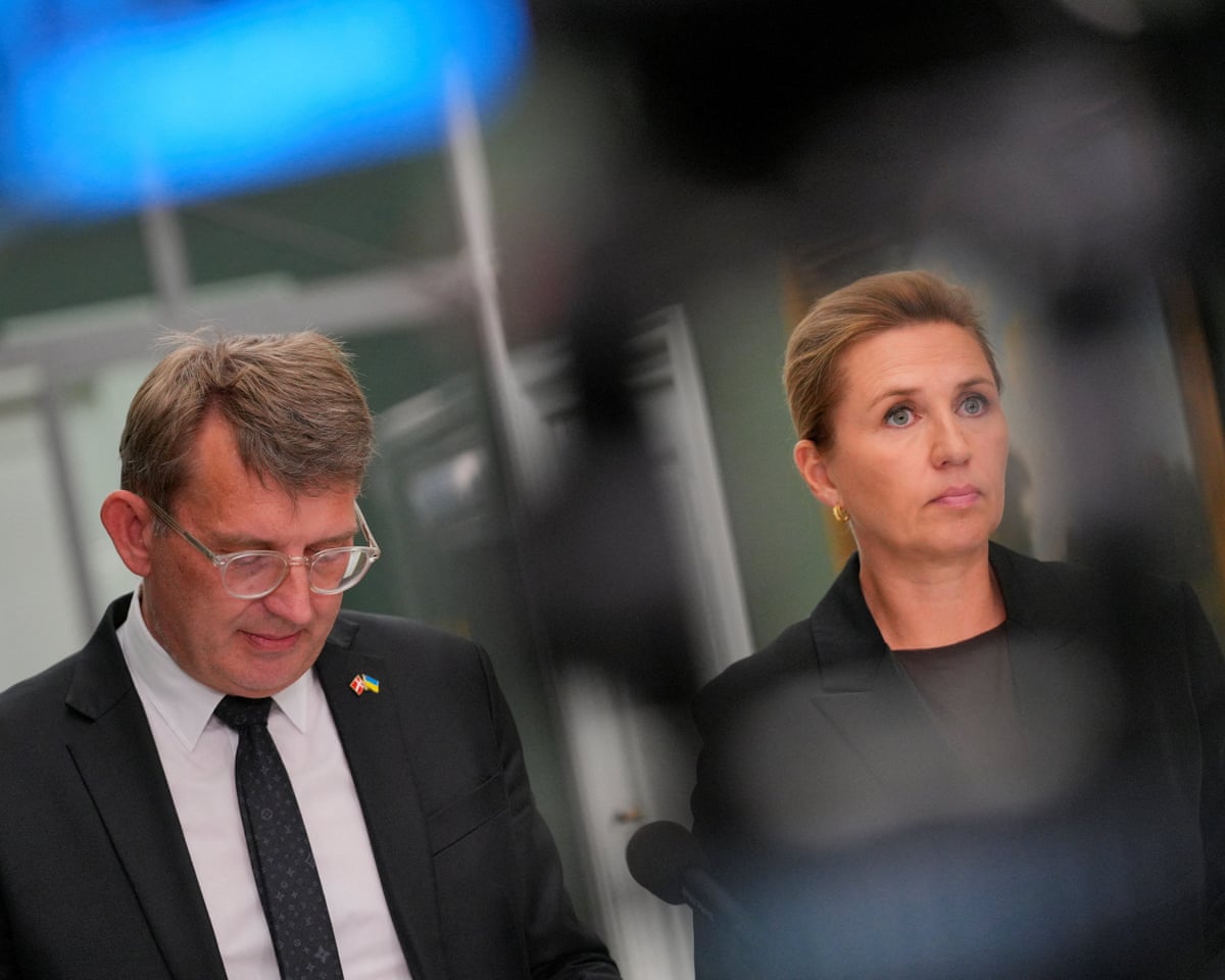 Troels Lund Poulsen and outgoing prime minister Mette Frederiksen