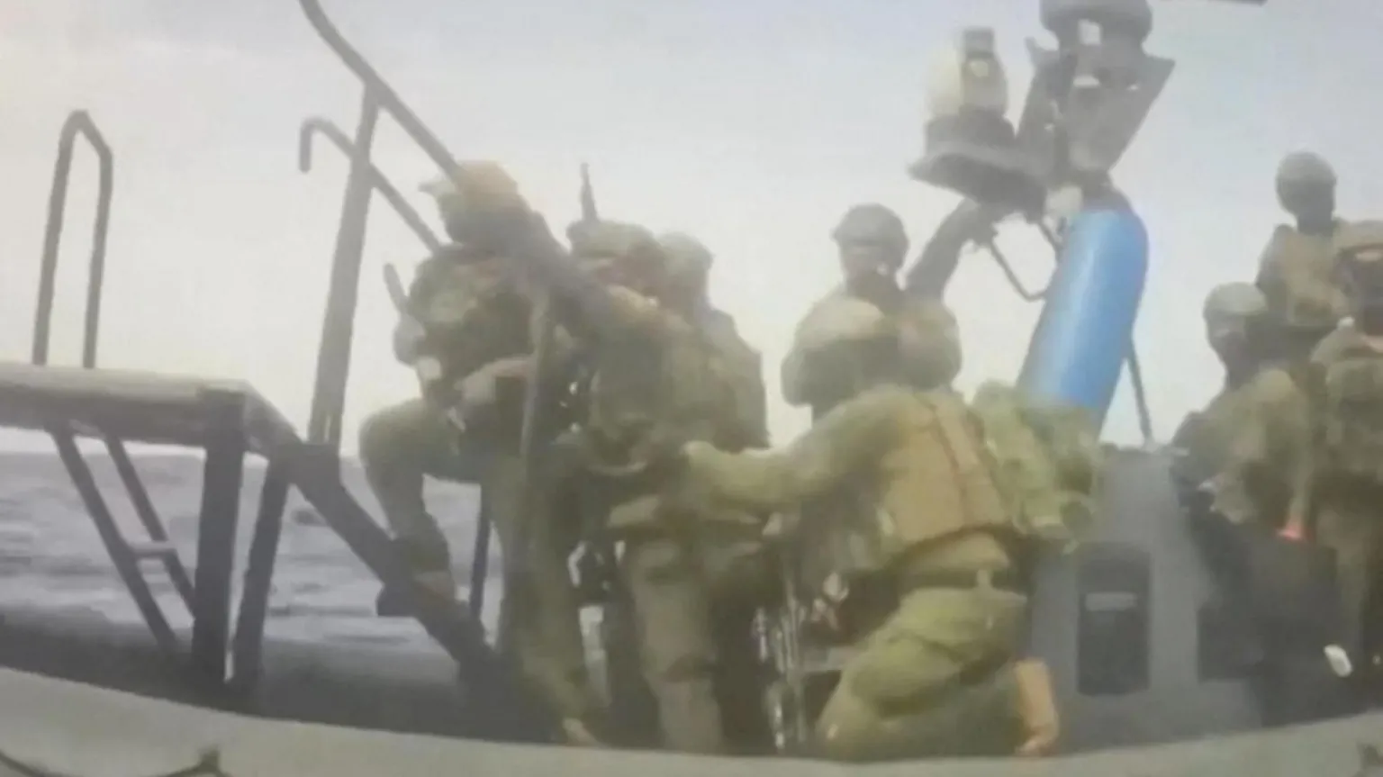 Global Sumud Flotilla/Handout via Video footage from the Global Sumud Flotilla showing armed commandos boarding a sailboat from a raiding craft in the Mediterranean, west of Cyprus (18 May 2026)