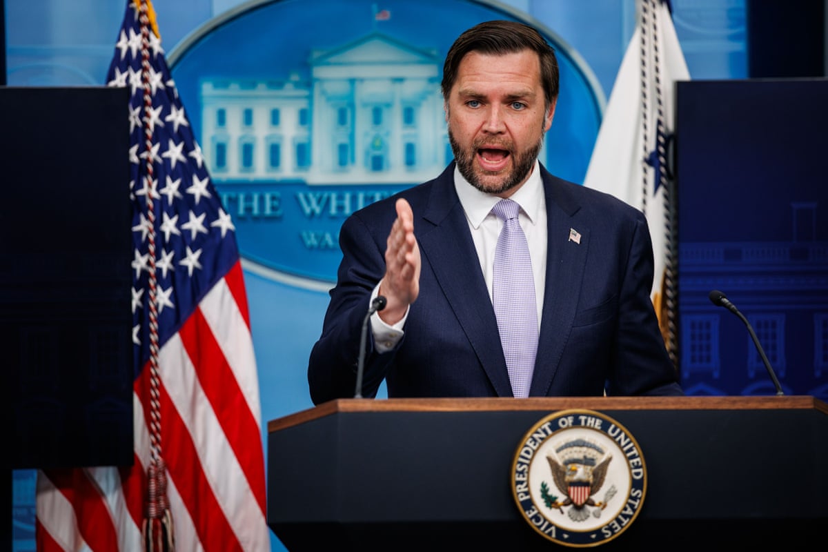 A man speaking at a podium