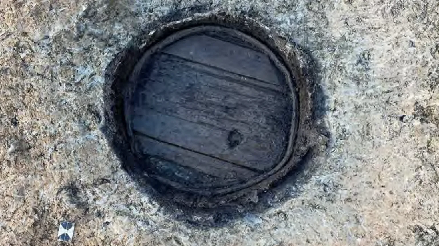 WWHA Post-medieval wooden barrel base in situ