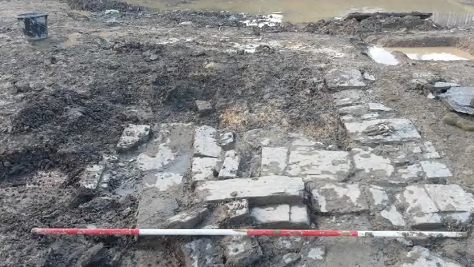 WWHA Post-medieval stone building partially excavated, view to west. 2m scale