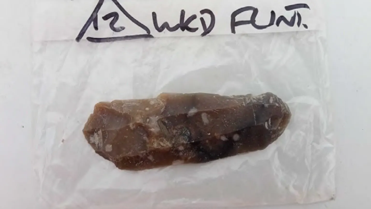 WWHA Neolithic blade recovered from grave fill
