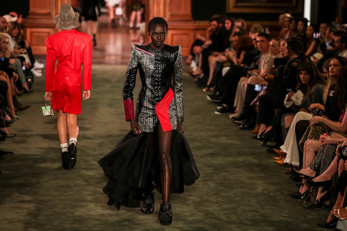 A model in a sculpted gown