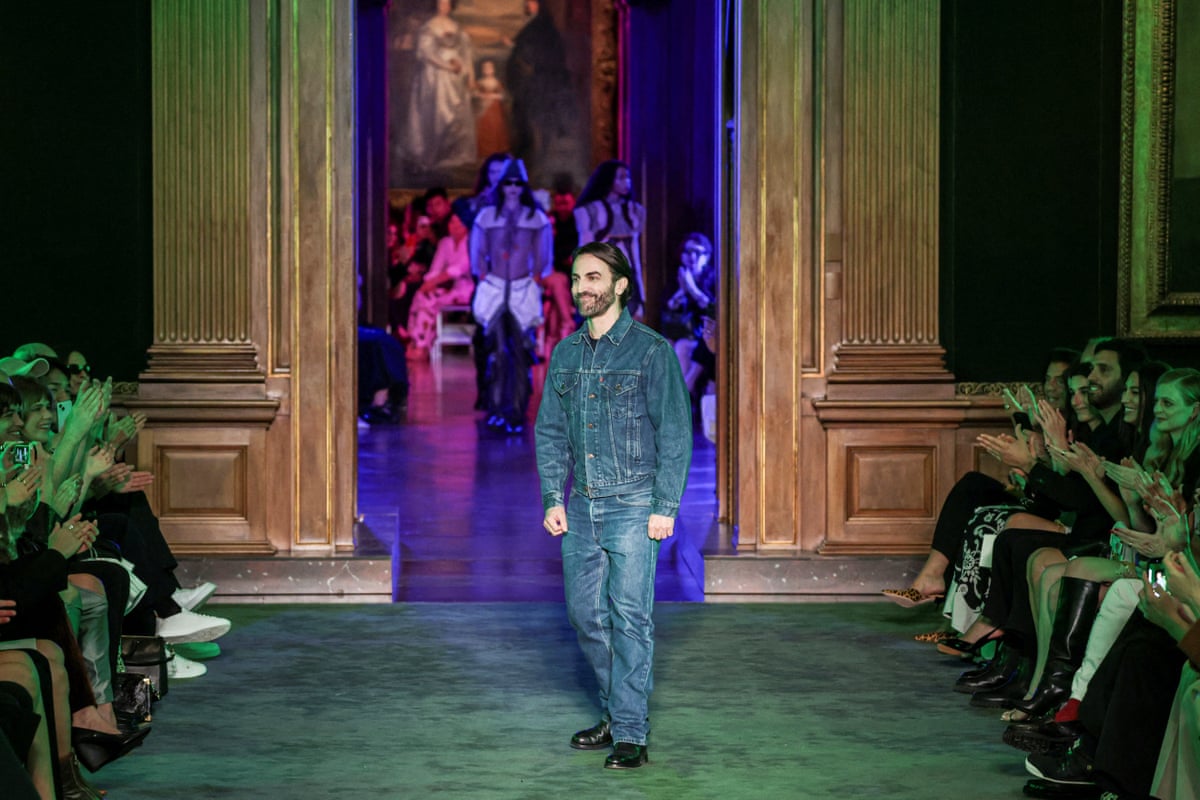 Nicolas Ghesquière greets the crowd after his show