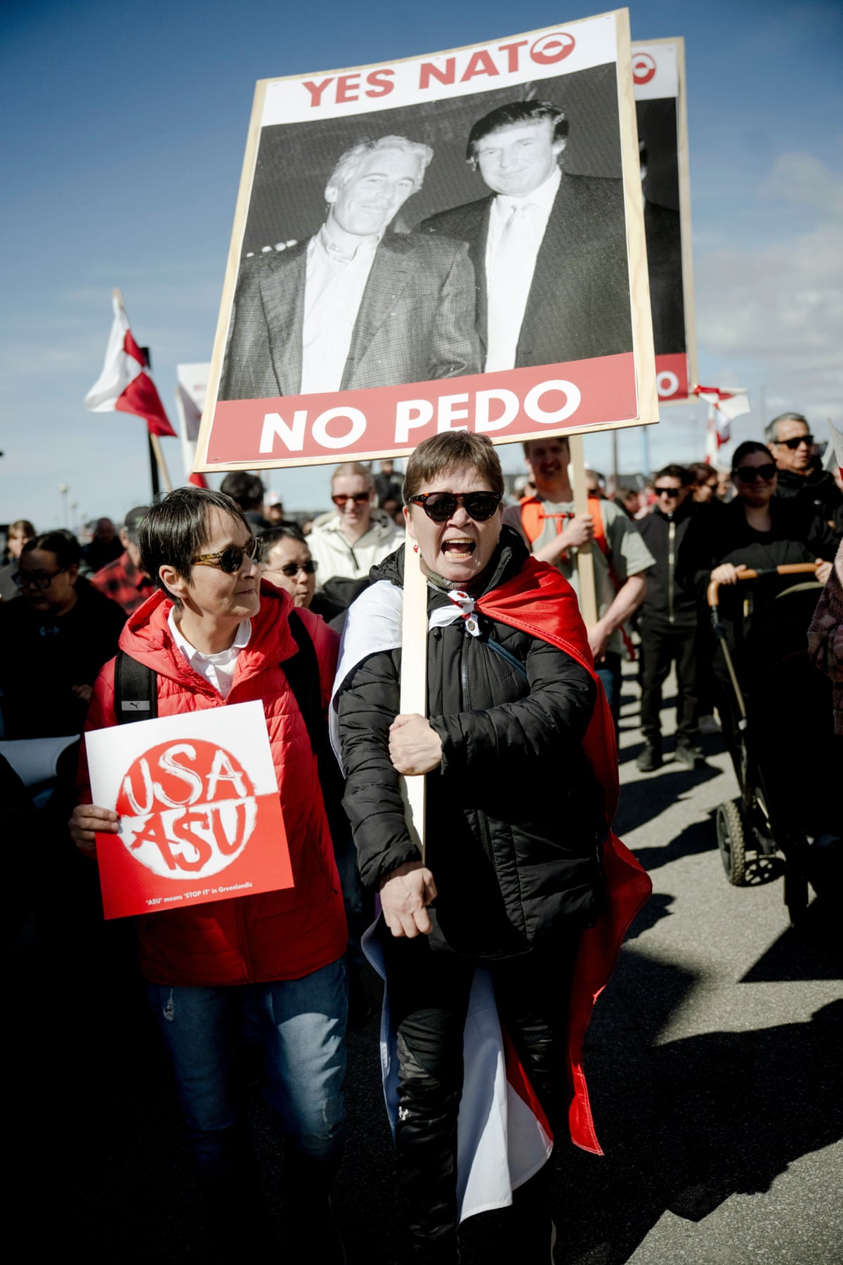 Protesters held anti-US and anti-Trump signs at the opening of a new US consulate in Nuuk, Greenland, on Thursday.