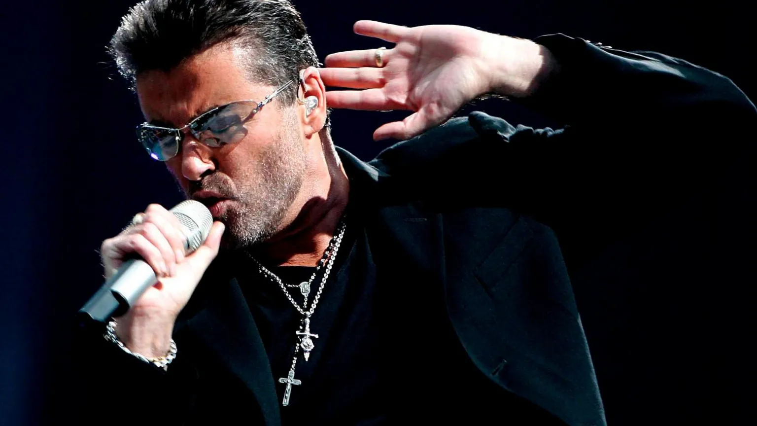 EPA George Michael performing on stage in Amsterdam in 2007