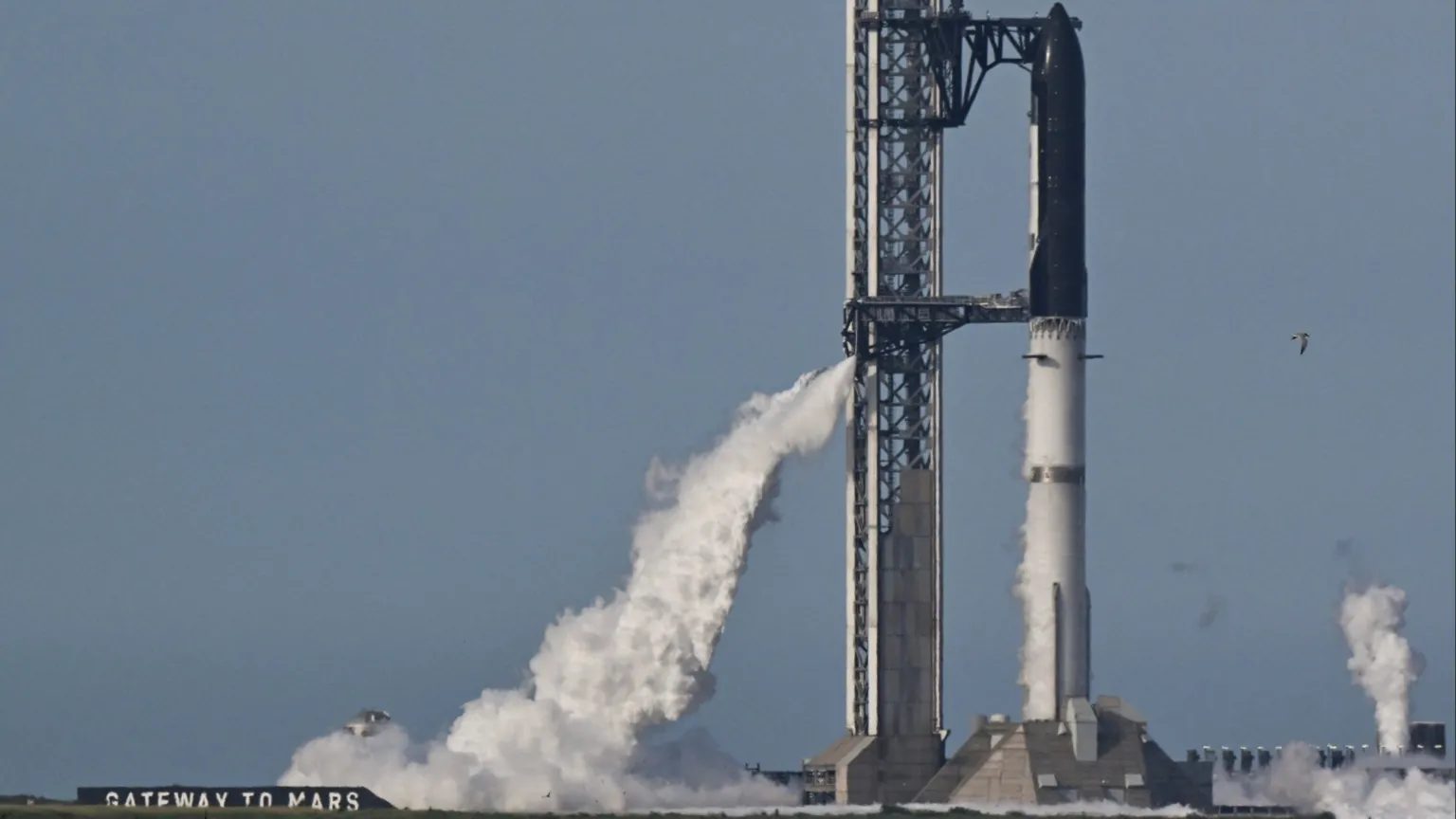 The SpaceX Starship spacecraft sits atop the Super Heavy Booster, ahead of the 12th test flight of the Starship spacecraft in Starbase, Texas, US, 21 May, 2026.