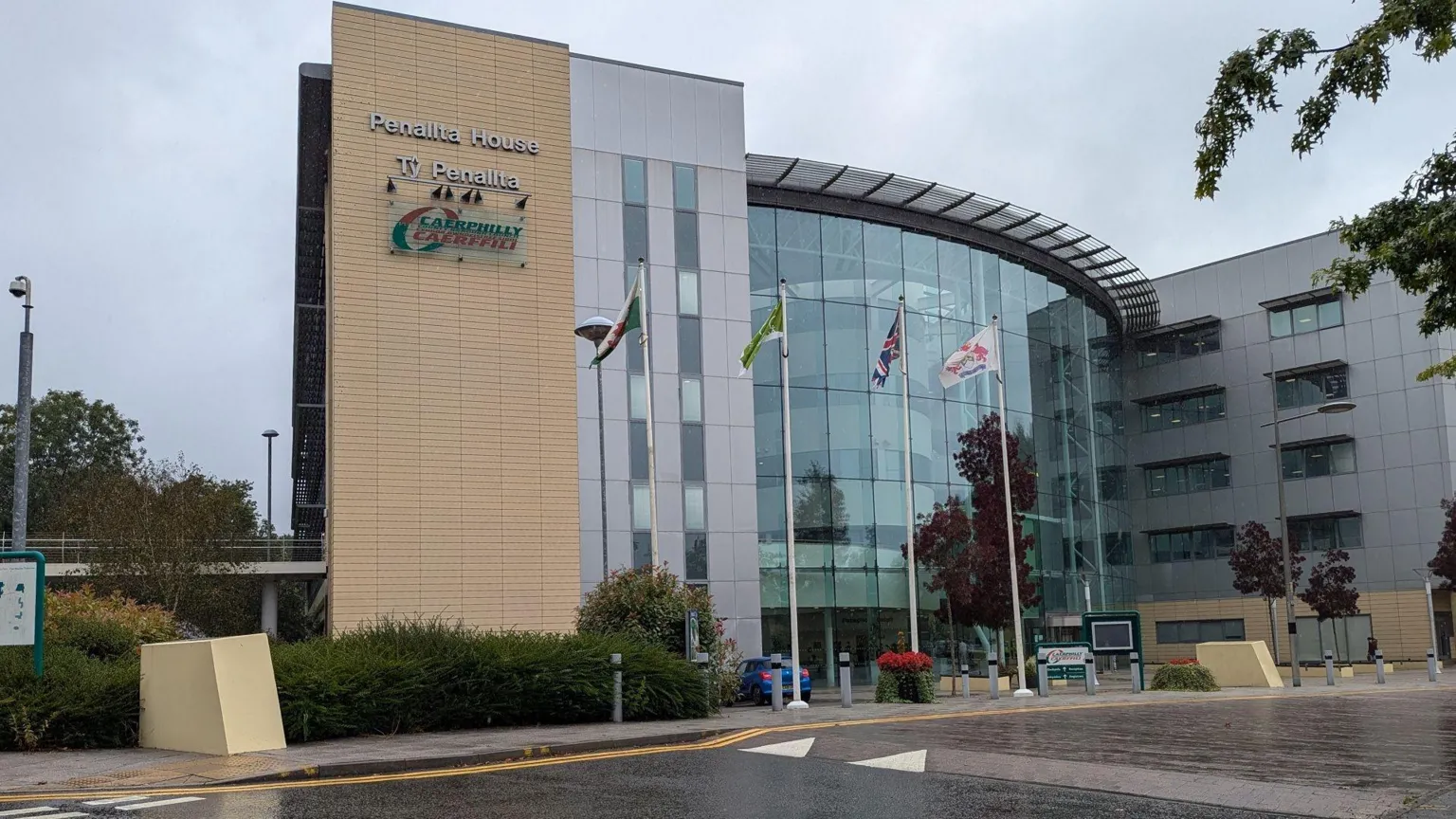 Caerphilly council a stock image of Penallta house a glass and beige brick building that is the headquarters of Caerphilly council 