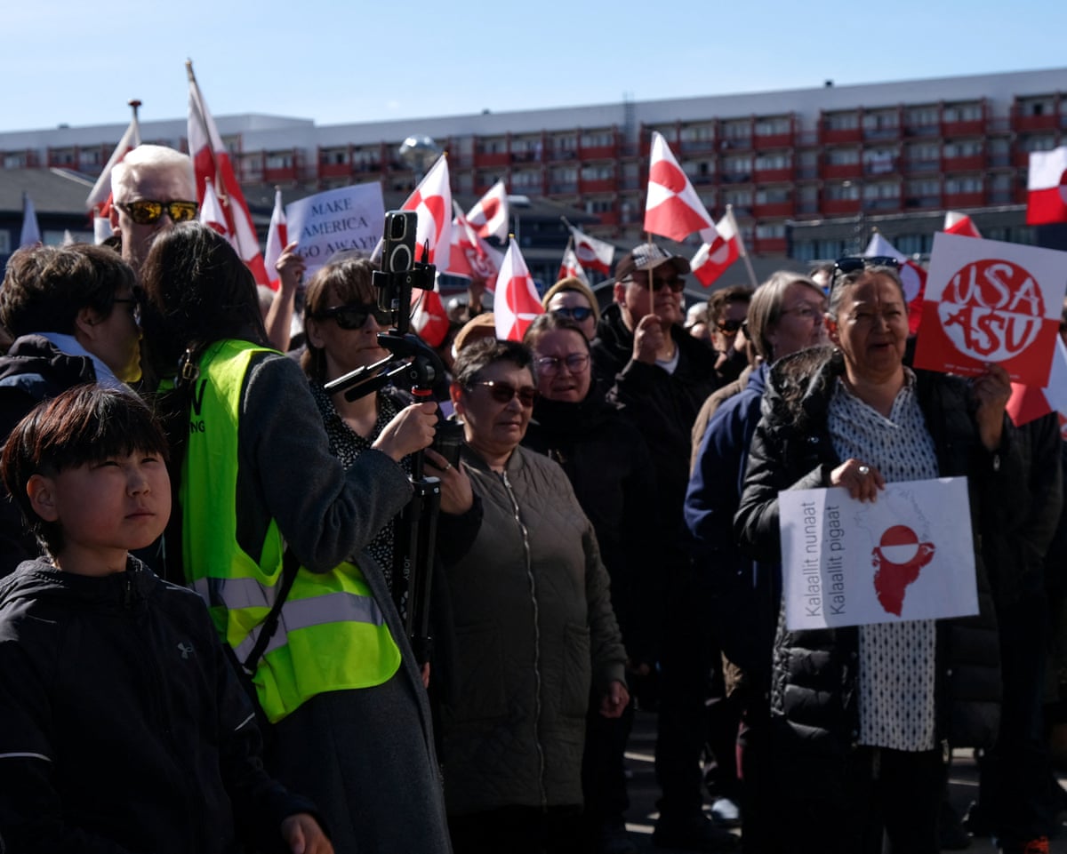 People gather to protest on the day of the opening of a new US consulate in Nuuk, Greenland.