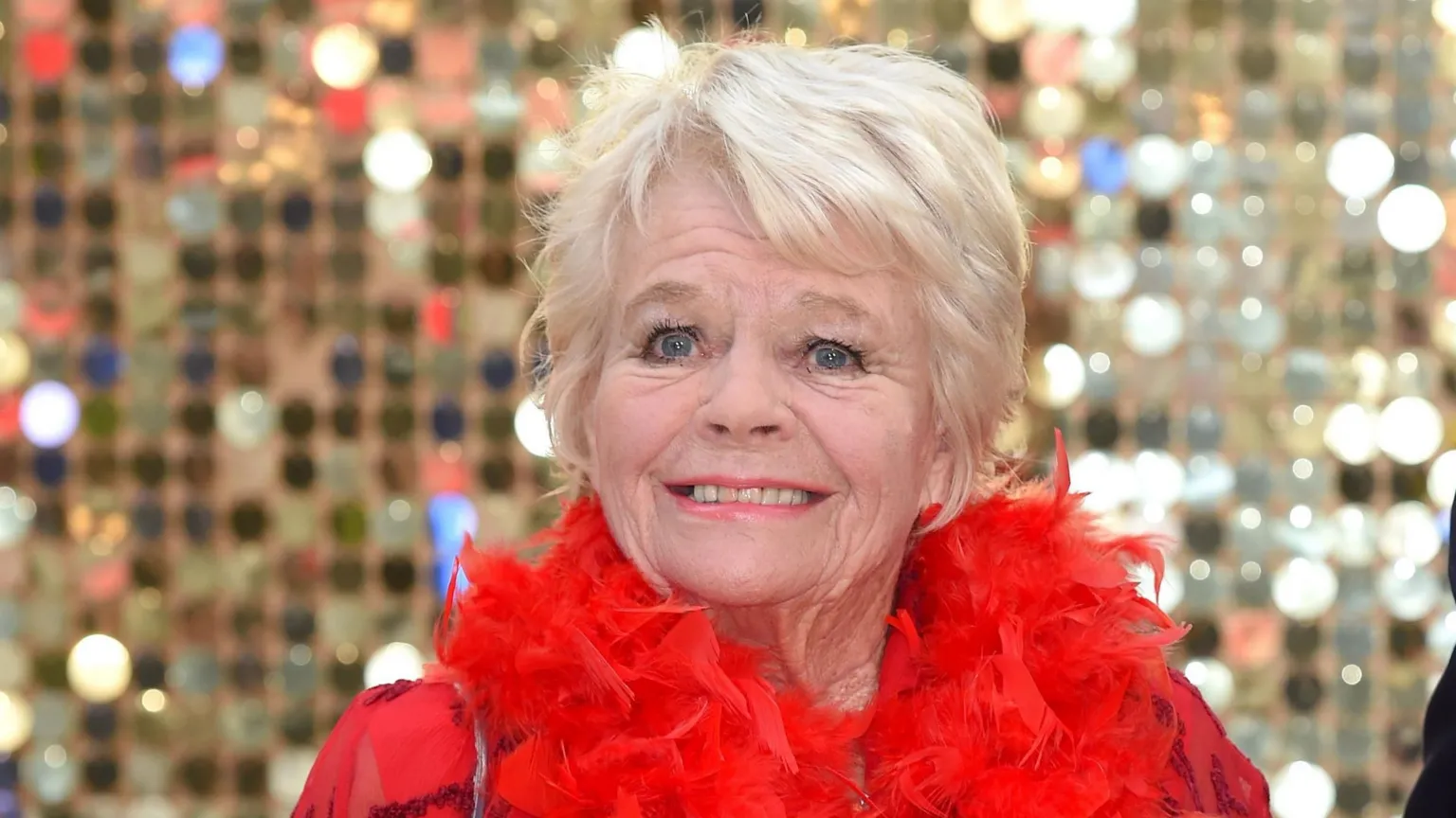 Judith Chalmers in a red dress