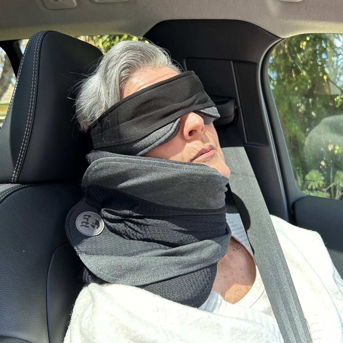 A person using a Trtl Snooze Bundle