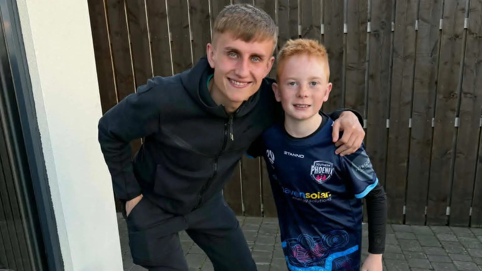 Mark Smith A man and young boy pose for a picture