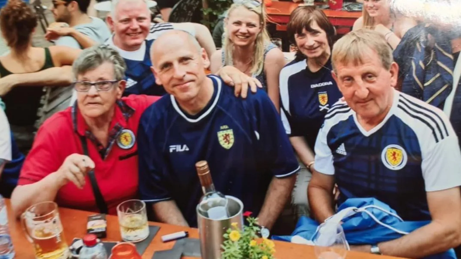Fiona Brown Six people wearing Scotland national team jerseys, that feature team's crest. 