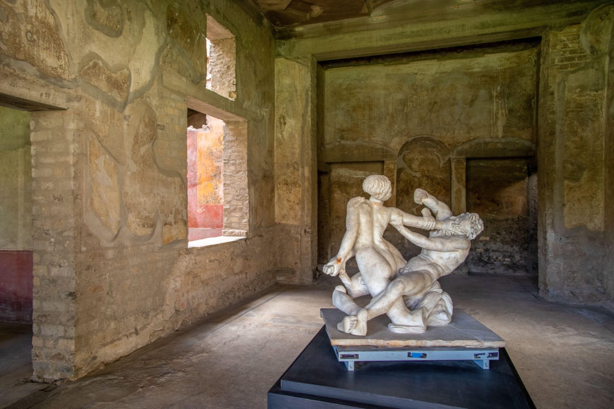 Marble statues in a villa room