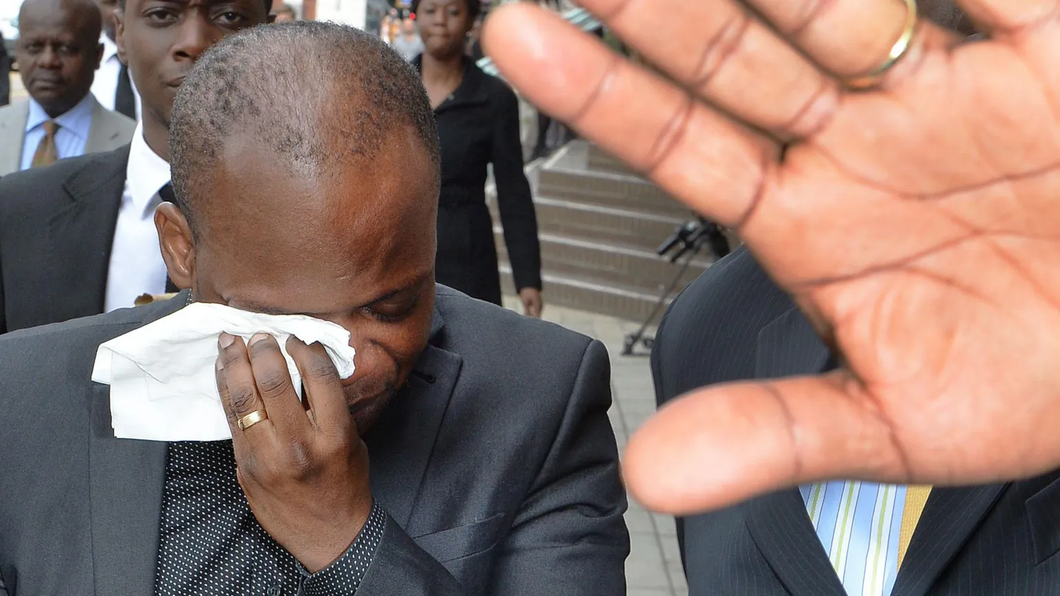 Pastor Eric Adusah leaves an inquest into the death in March 2015 of his wife Charmain Speirs in Ghana, where an open verdict was given by the Coroner in Chelmsford Essex.