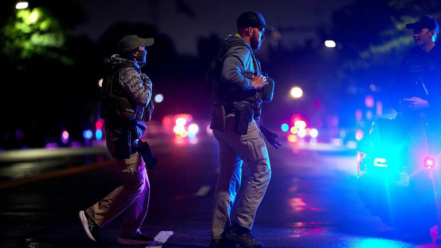 Law enforcement officers respond following reports of gunfire near the White House in Washington, DC, US, on Saturday, May 23, 2026.