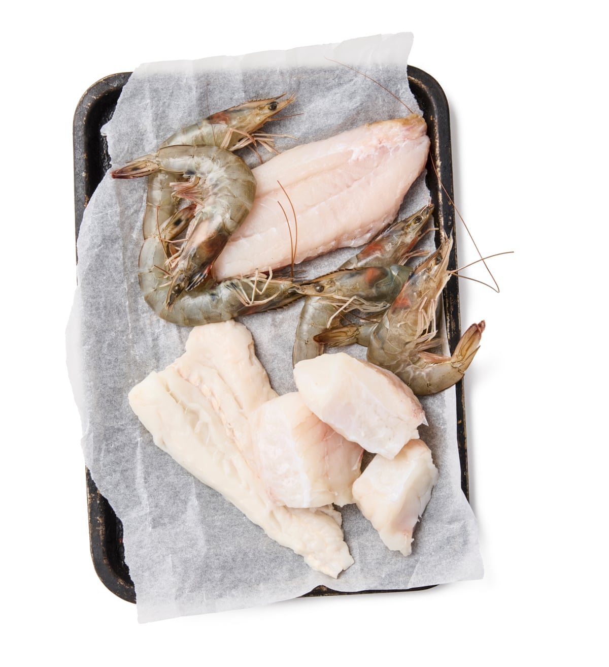 Felicity Cloake’s provencal fish stew 01a. Some white fish and prawns, both raw.