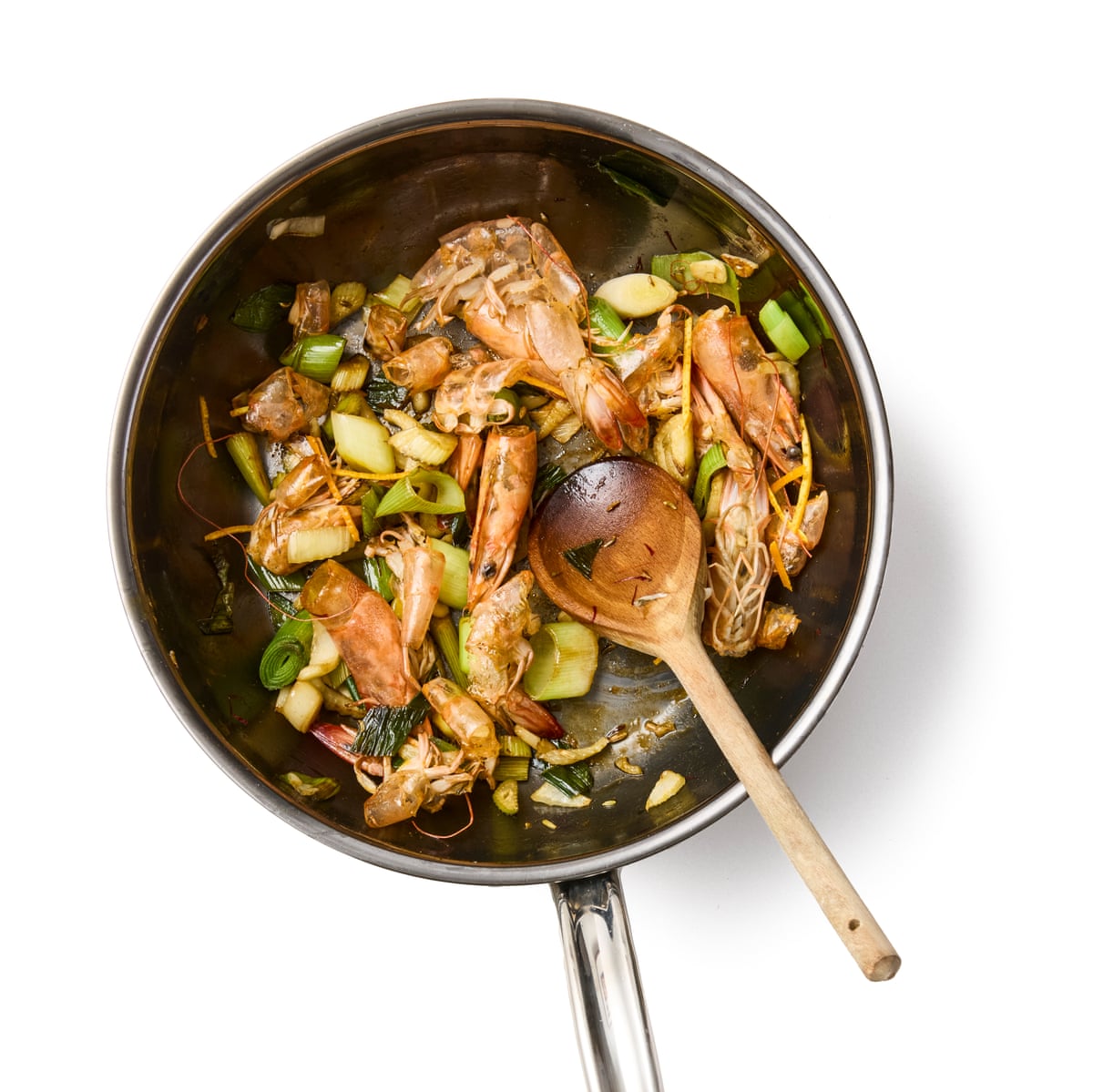 Felicity Cloake’s provencal fish stew 03a. A pan ... frying the shells and onions.