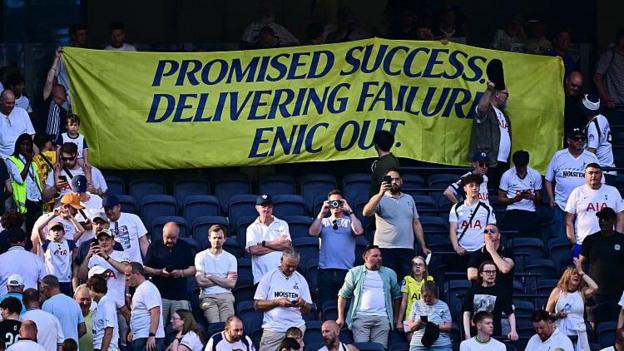 Spurs fans protested against owners ENIC after they guaranteed Premier League survival with victory against Everton.