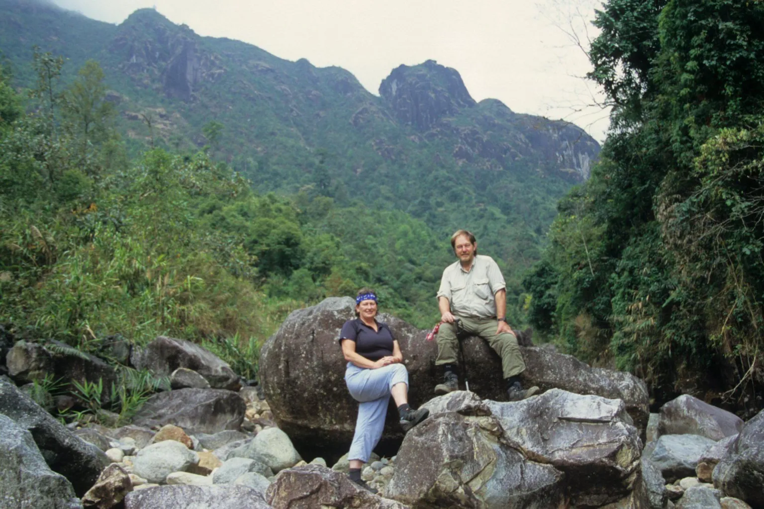 Bleddyn and Sue Wynn Jones Bleddyn and Sue Wynn Jones. Sue is stood in front of a boulder and Bleddyn is sat on one