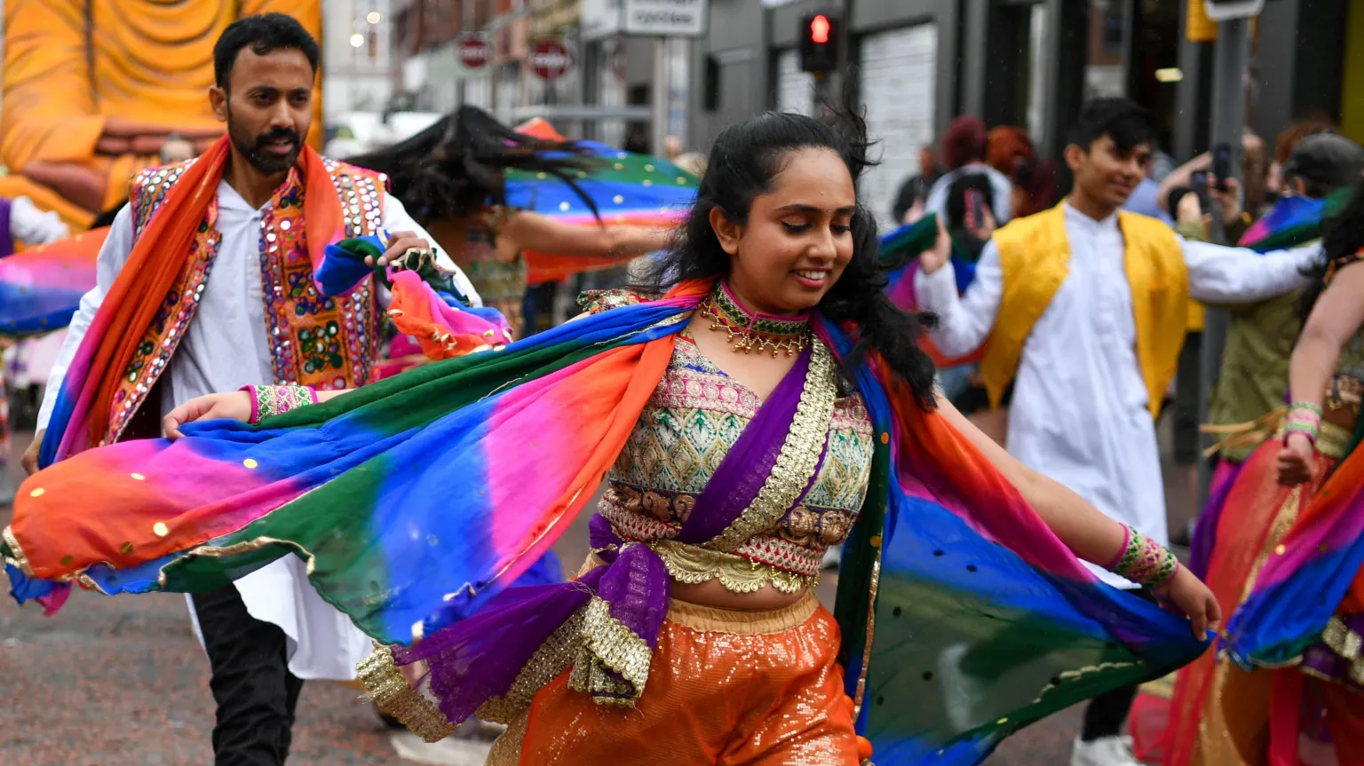 Pacemaker Indian dancers in traditional clothing on parade