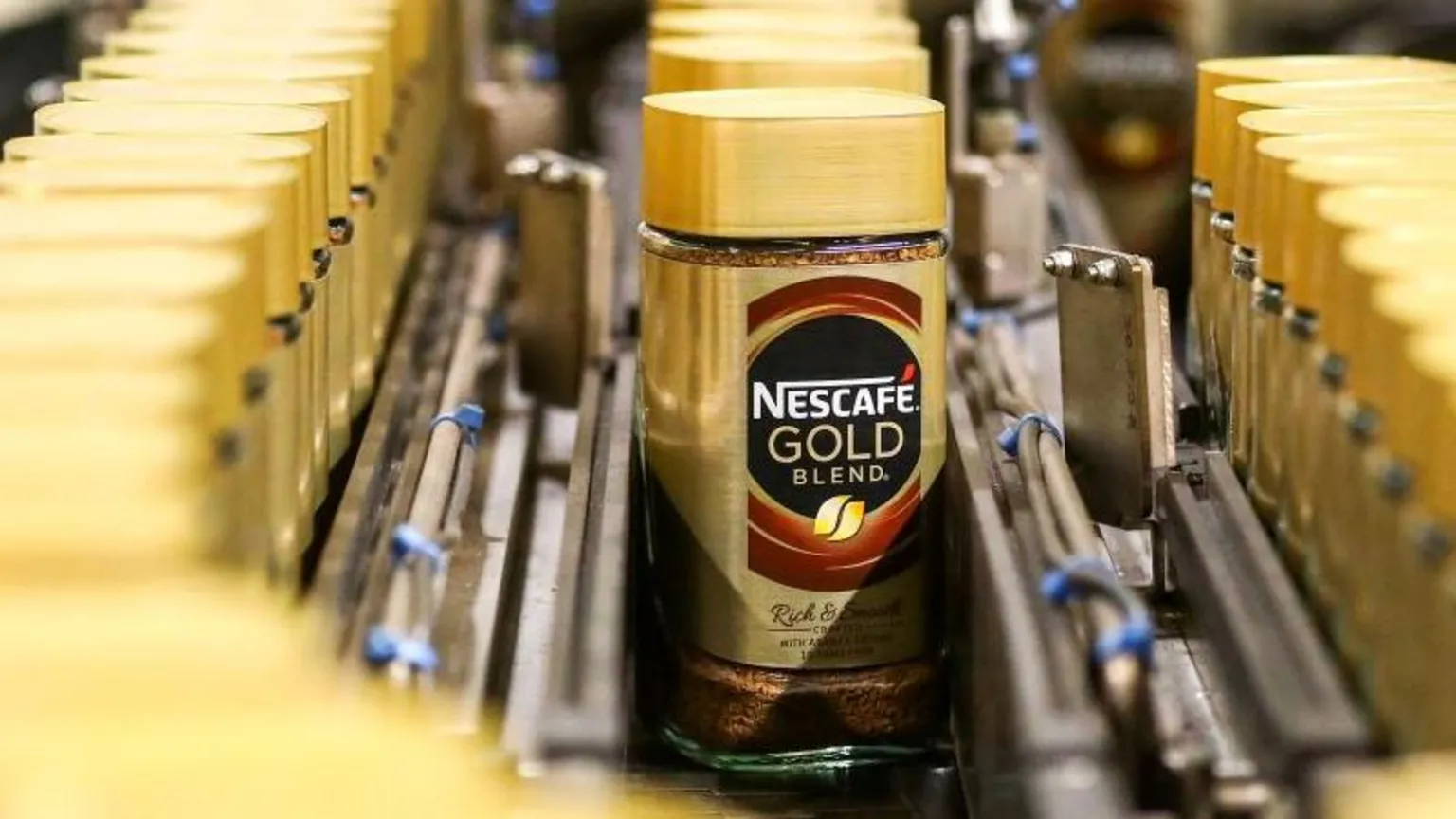  Nescafe gold jar on production line