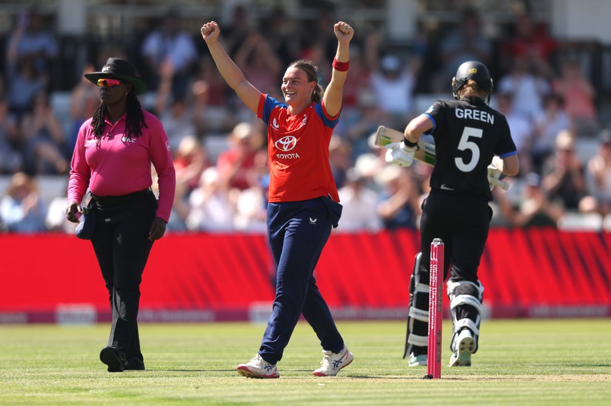 Dani Gibson celebrates after taking the wicket of New Zealand's Maddy Green