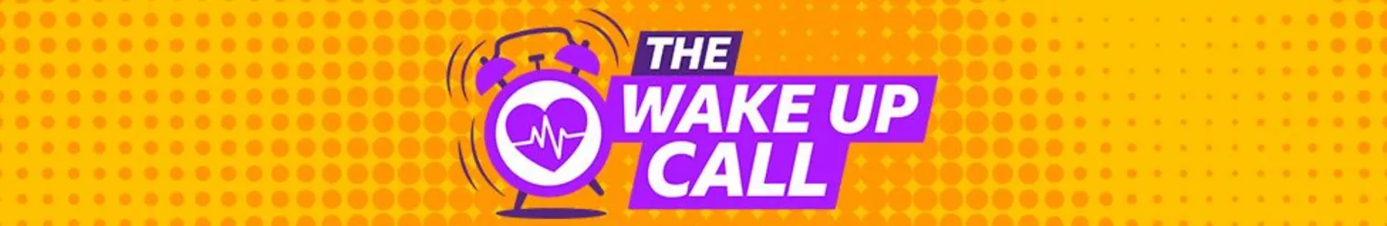 The Wake Up Call logo in purple and white, which includes and alarm clock with a heart with a pulse like through it on its face, on a yellow backgroud with orange circles on it. 