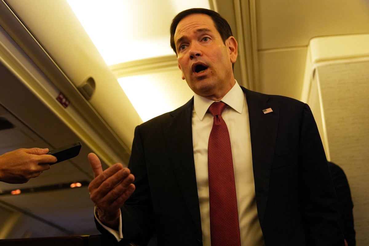Marco Rubio speaks to reporters on board his plane at Jaipur International Airport.