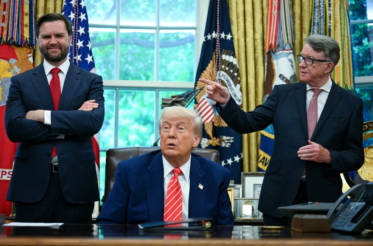 Mandelson gestures as he stands behind a seated Donald Trump in the Oval Office, as a smiling JD Vance stands at the opposite side of Trump