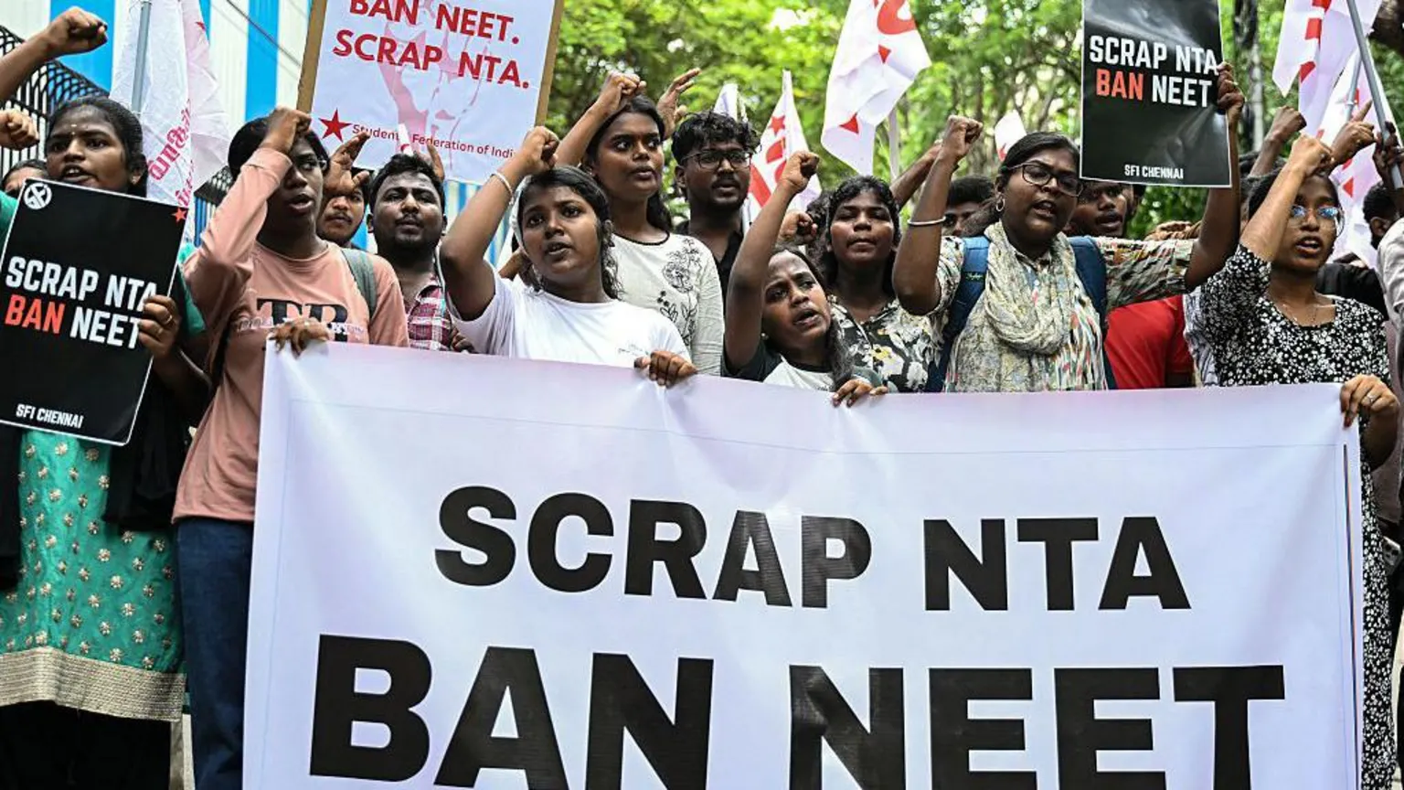 Members of the Students' Federation of India protest against the National Testing Agency (NTA) after the cancellation of the NEET examination over an alleged paper leak, in Chennai on May 14, 2026.