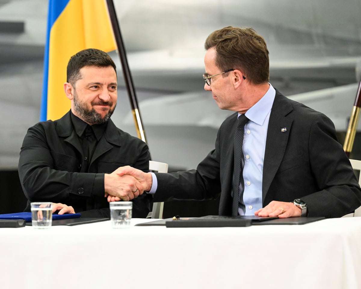 Swedish prime minister Ulf Kristersson and Ukrainian president Volodymyr Zelenskyy sign a letter of intent during a press conference following their meeting and visit to Saab in Linkoping, Sweden in October last year.