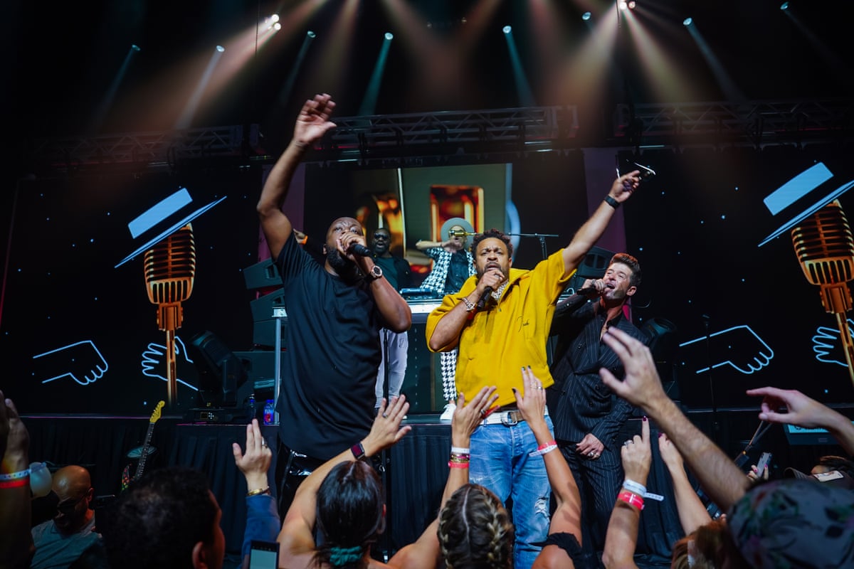 Wyclef Jean, Shaggy and Robin Thicke (from left to right) perform at the Williams Racing grand opening event before the US Grand Prix in 2022.