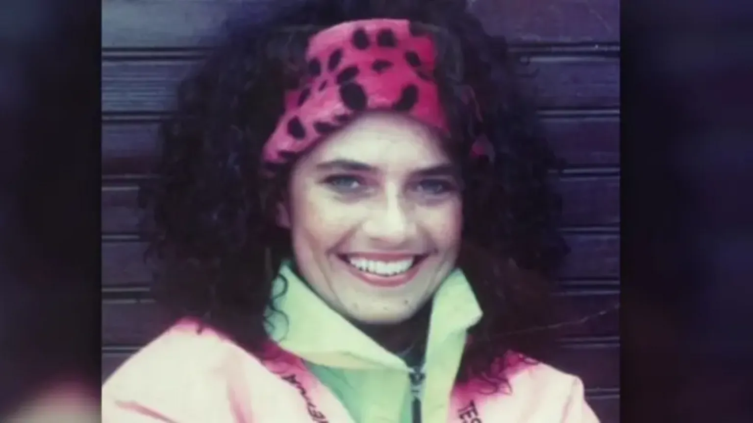 Handout The FTD brother's mum Geraldine. She has dark curly hair, wearing a pink headband and green and pink zip up jacket.