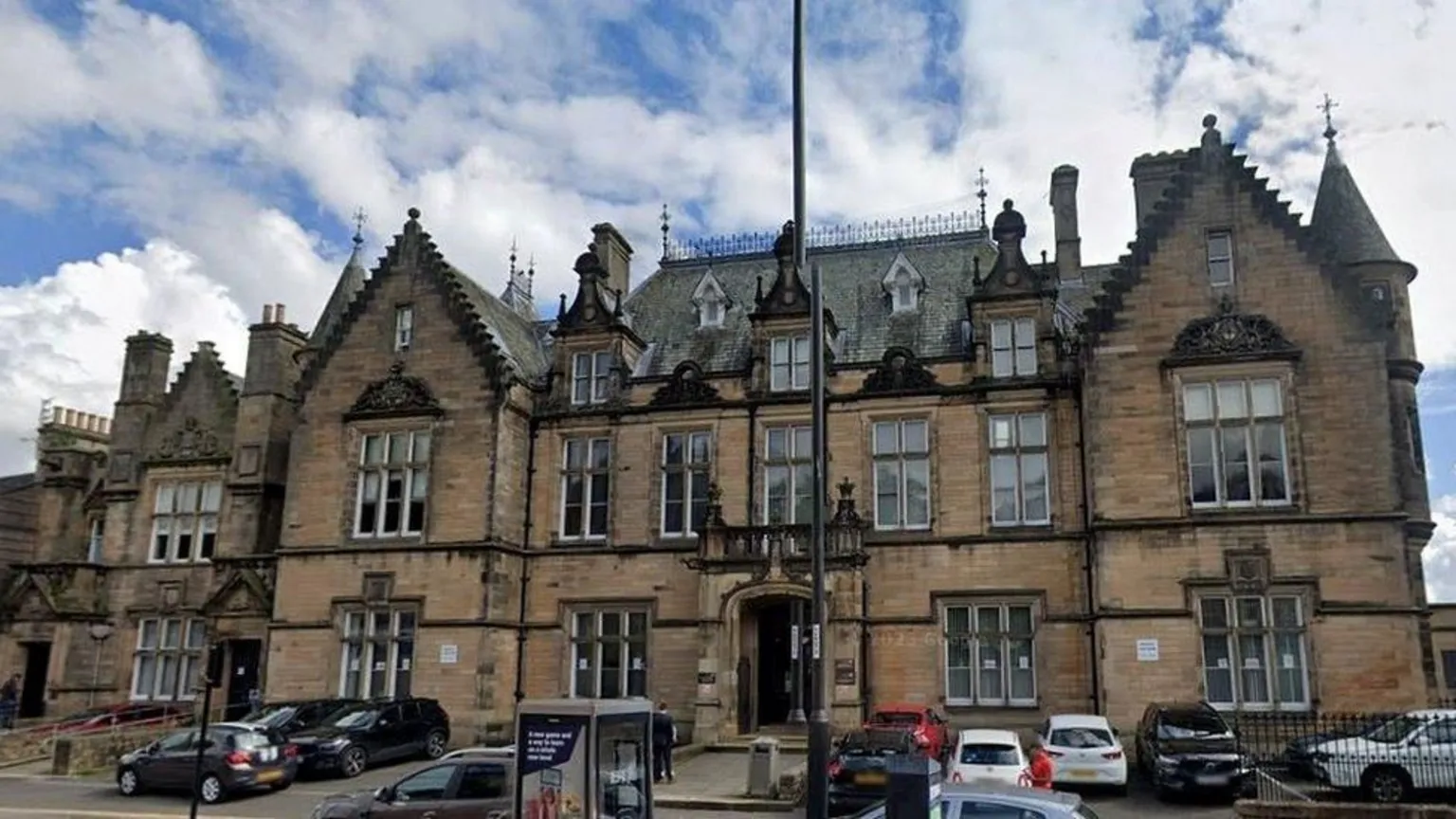 Google The exterior of Stirling Sheriff Court, which hosts the High Court. A large three-storey sandstone building with cars parked outside