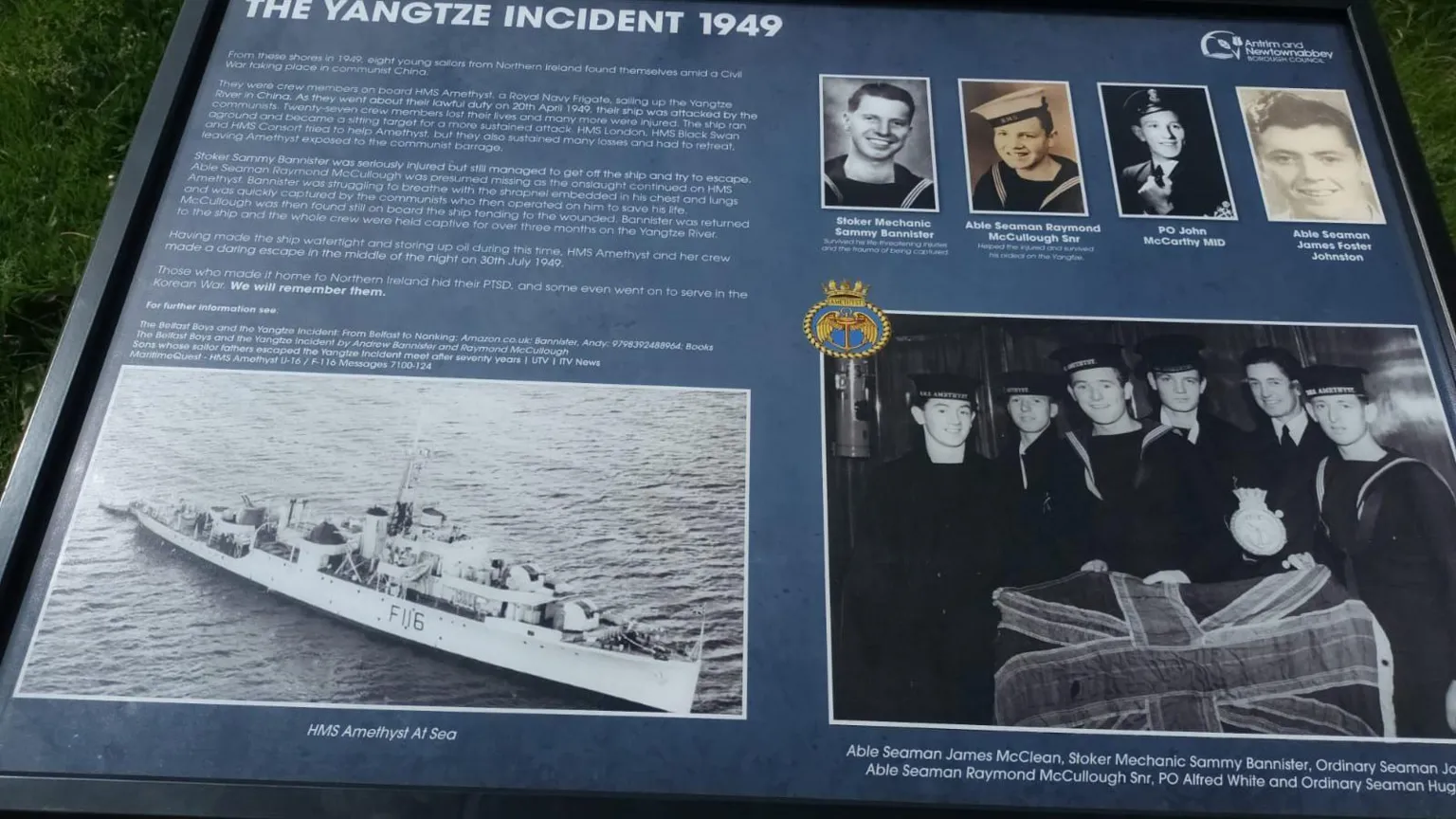 Andrew Bannister A blue storyboard with a picture of the ship and the sailors that were on it, including individual pictures of the sailors from Northern Ireland.