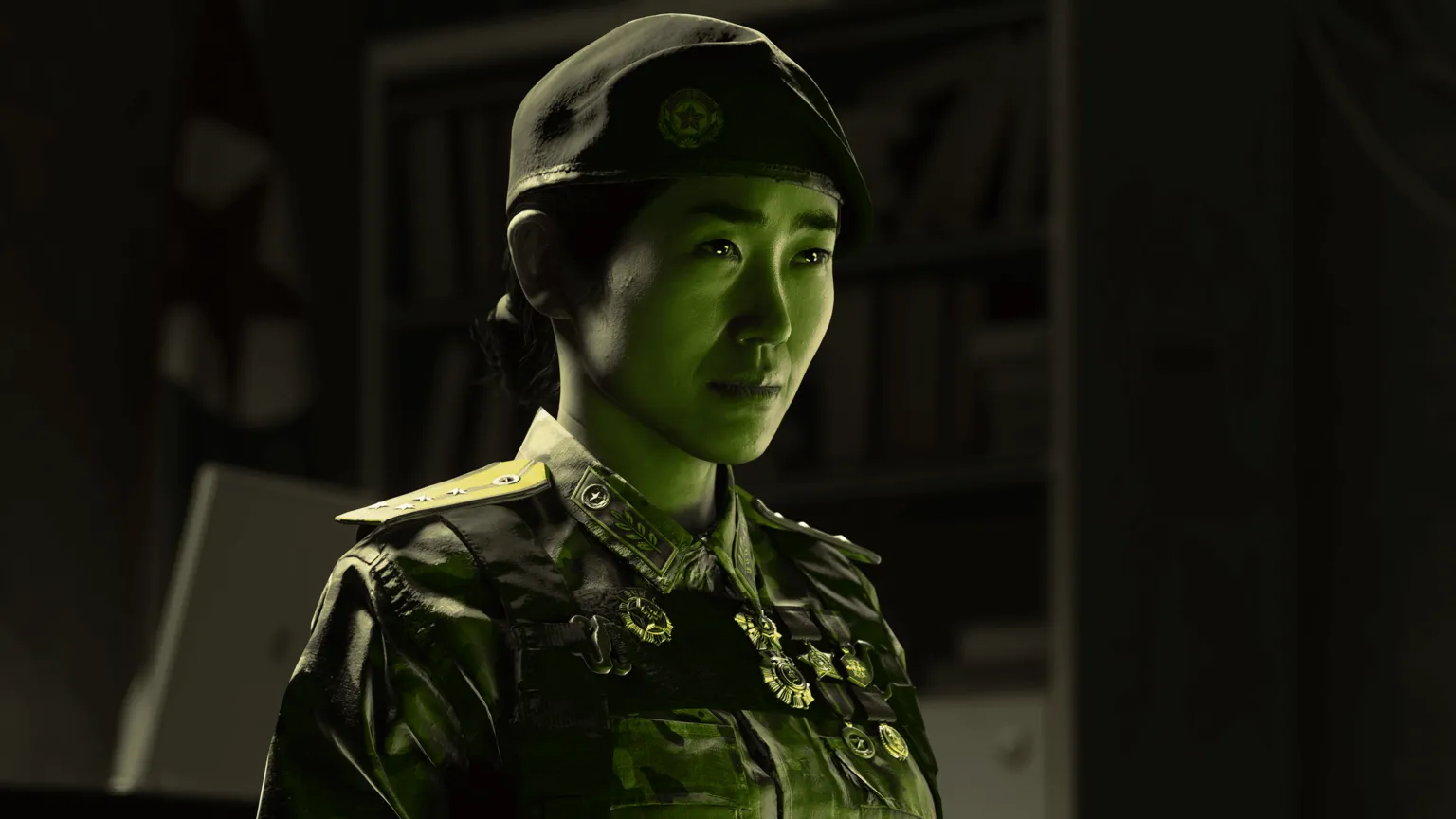 Infinity Ward/ Activision An in-game screenshot showing a Korean female soldier lit in green, with medals on her uniform.