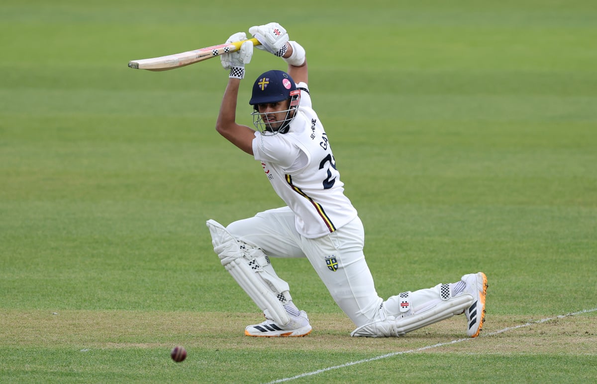 Emilio Gay cover drives to the boundary.