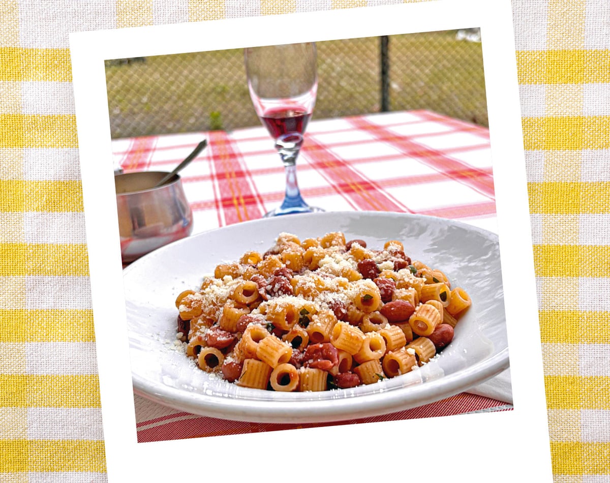 pasta with beans and glass of red wone