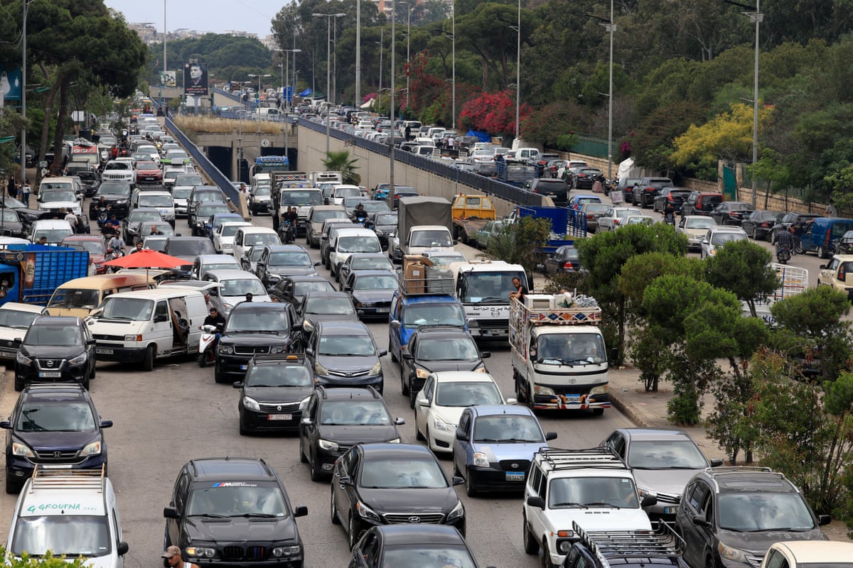 Heavy traffic across many lanes on roads out of Beirut's suburbs.