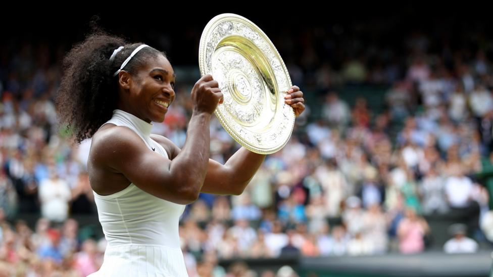 Serena Williams holds the Wimbledon women's singles trophy