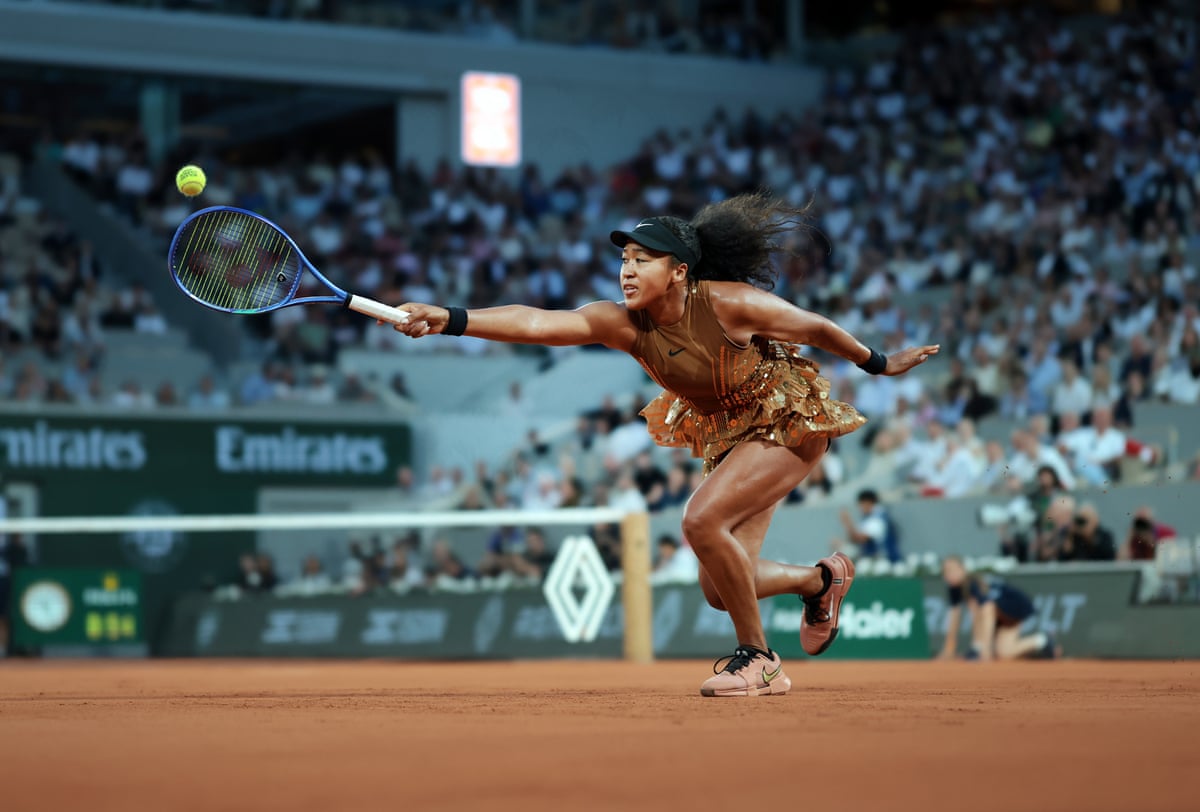 Naomi Osaka reaches for a backhand