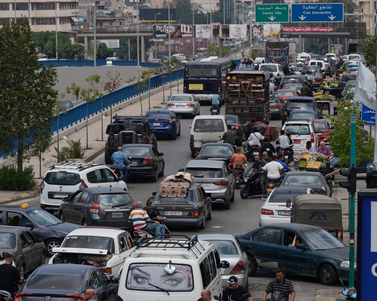 Traffic on a Beirut highway on Monday as residents flee after an Israeli threat to strike the southern suburbs