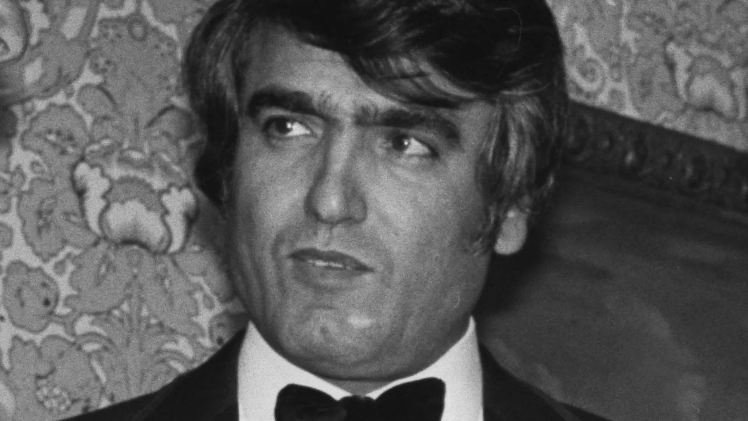 B. Gomer/Express/Hulton Archive/ Black and white headshot of Ahmed Obaidly, a United Arab Emirates diplomat and associate of Al Fayed